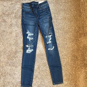 American Eagle Blue Jeggings with Distressed Details